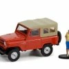 Greenlight 1975 Nissan Patrol And Backpacker Figurine, Orange And Tan - 97120A/48 - 1/64 Scale Diecast Car -Cars Sales 97120A 48 GL The Hobby Shop Series 12 164 1 72375.1650414638.386.513